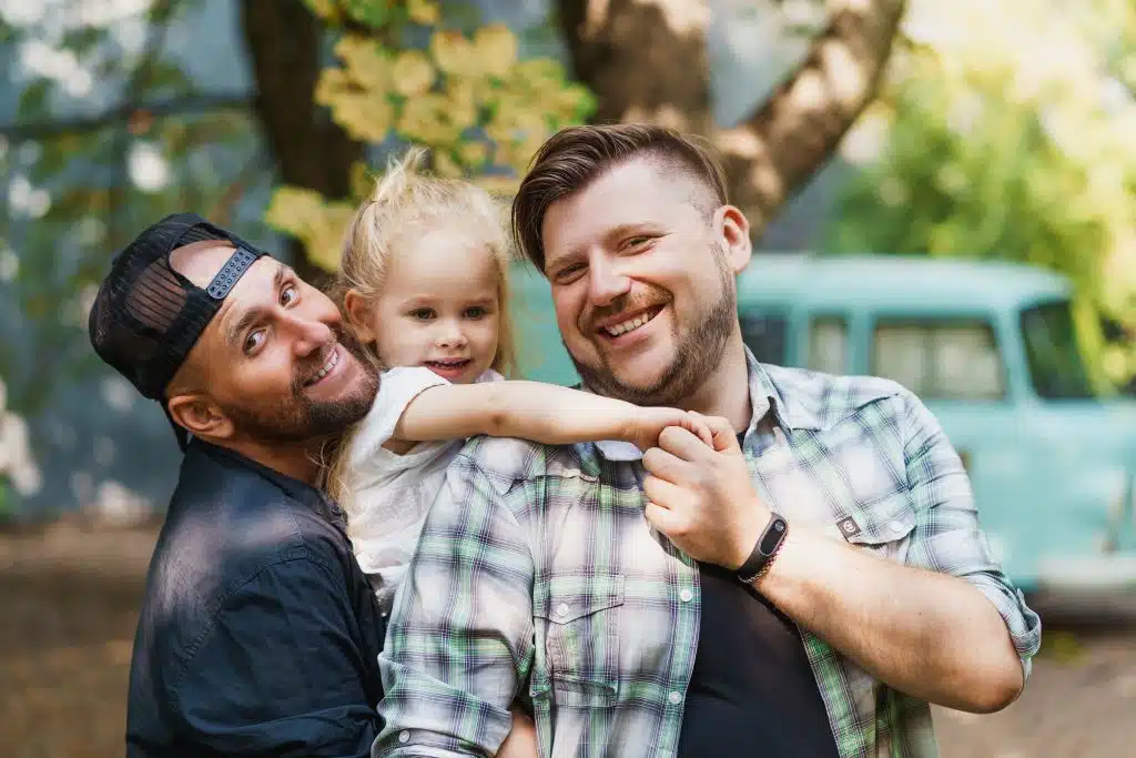 a gay couple with their daughter