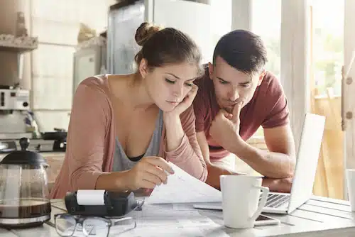 couple budgeting together and assessing their finances